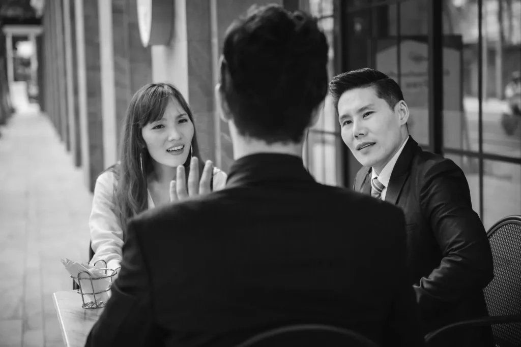 Experienced mortgage broker in Annandale discussing home loan options with clients in a modern office